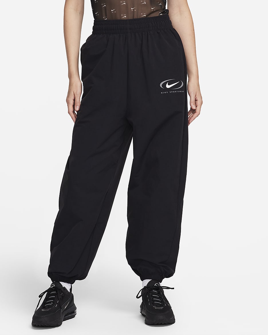 Nike Sportswear Women s Woven Joggers. Nike